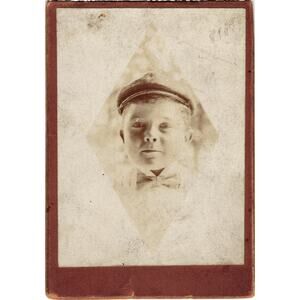 Antique Cabinet Card Boy in Cap and Bow Tie Early Photograph on Brown Mount‎